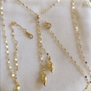 Stamped 14k gold elongated disk lariat necklace